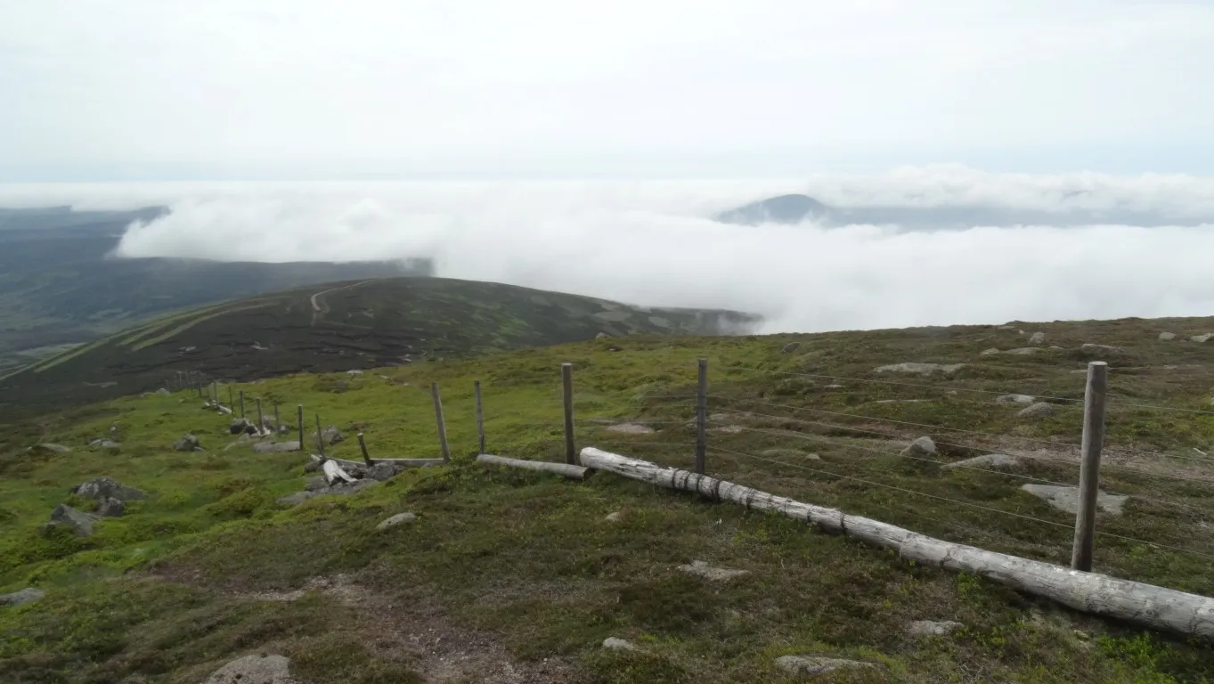 Setting off from Mount Battock. The fog is beginning to clear and I'm aiming for the end of the track which can be seen in the distance.