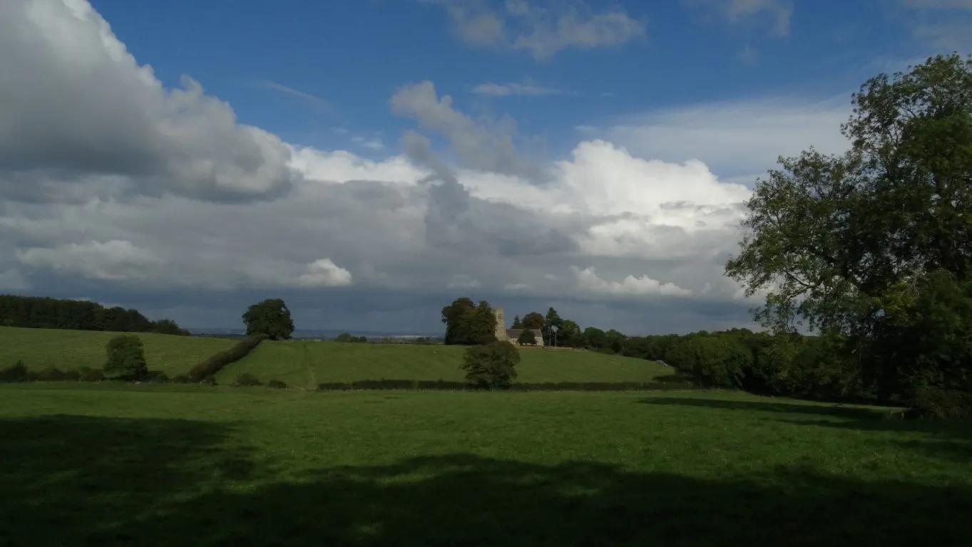 The isolated medieval church of Great Oxendon lies part way towards the deserted village of Little Oxendon. I make a detour to visit this church but by now the shower clouds are making an appearance on the horizon.