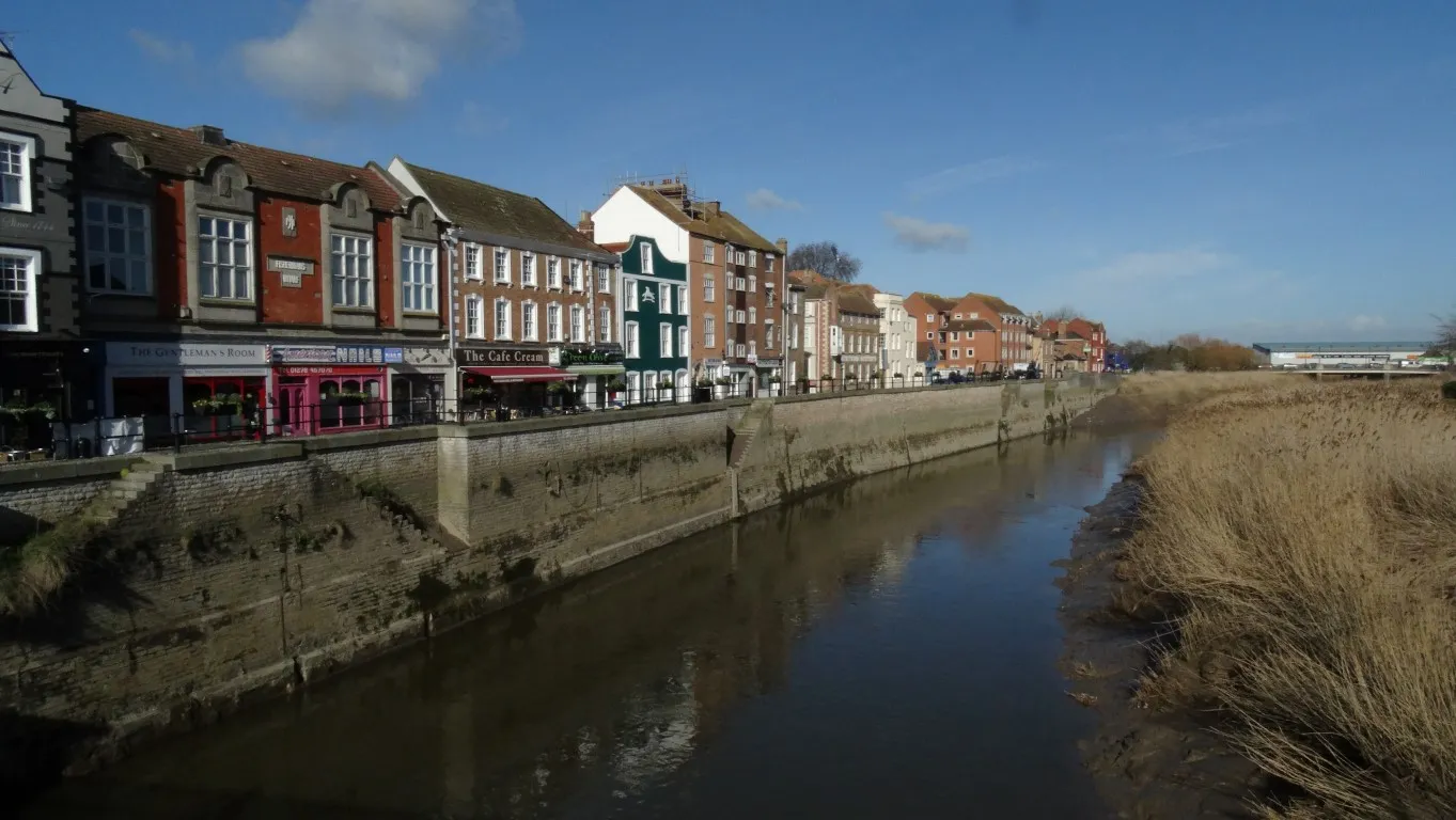 Bridgwater and the River Parrett at low tide. The town Bridge is the starting point for this walk to Burnham on Sea.