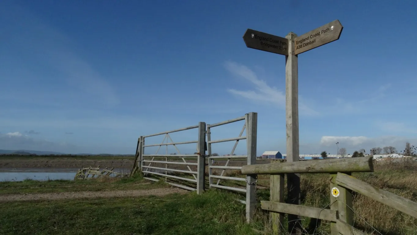 This new sign marks the English Coast Path. For a short distance you need to leave the riverside embankment.
