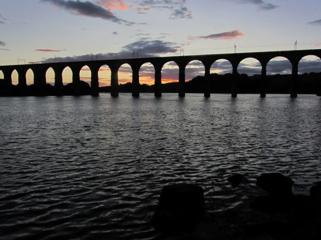 The Royal border Bridge carries the East Coast main line railway over the River Tweed seen here at sunset.