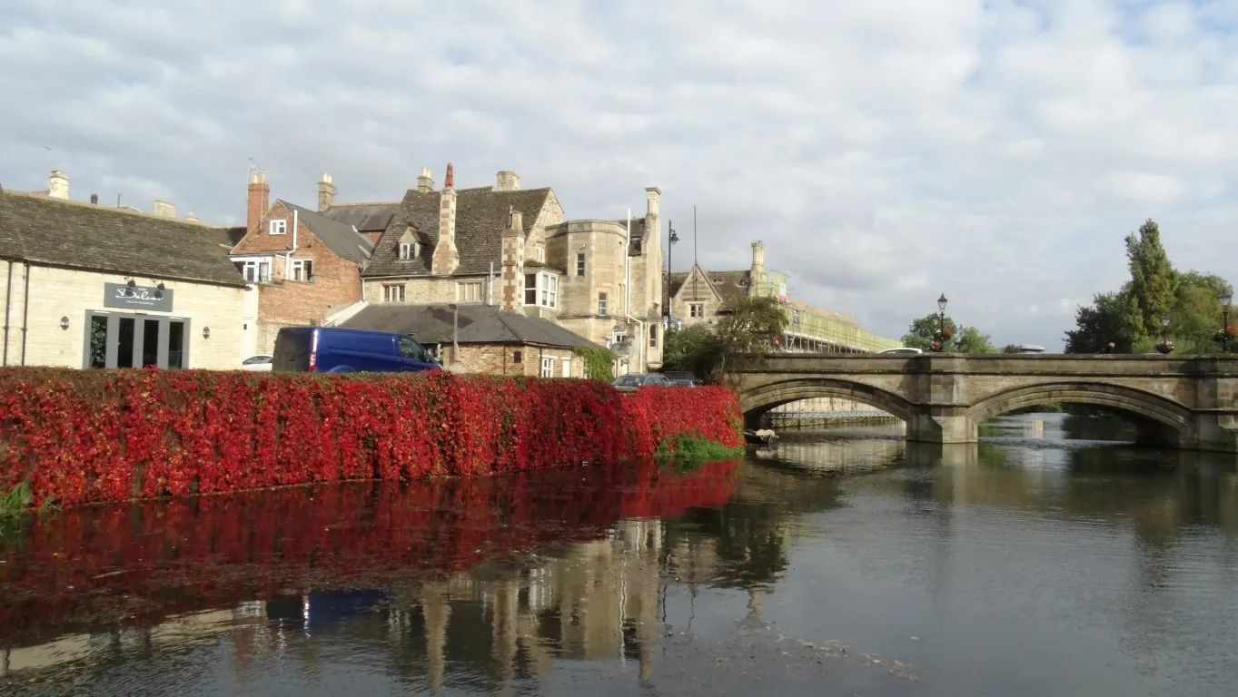 The end of the Jurassic Way in Stamford and signs that the weather is improving after a wet and gloomy day. This is the river Welland which flows through the town.